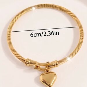 Twisted Gold Heart Charm Bracelet